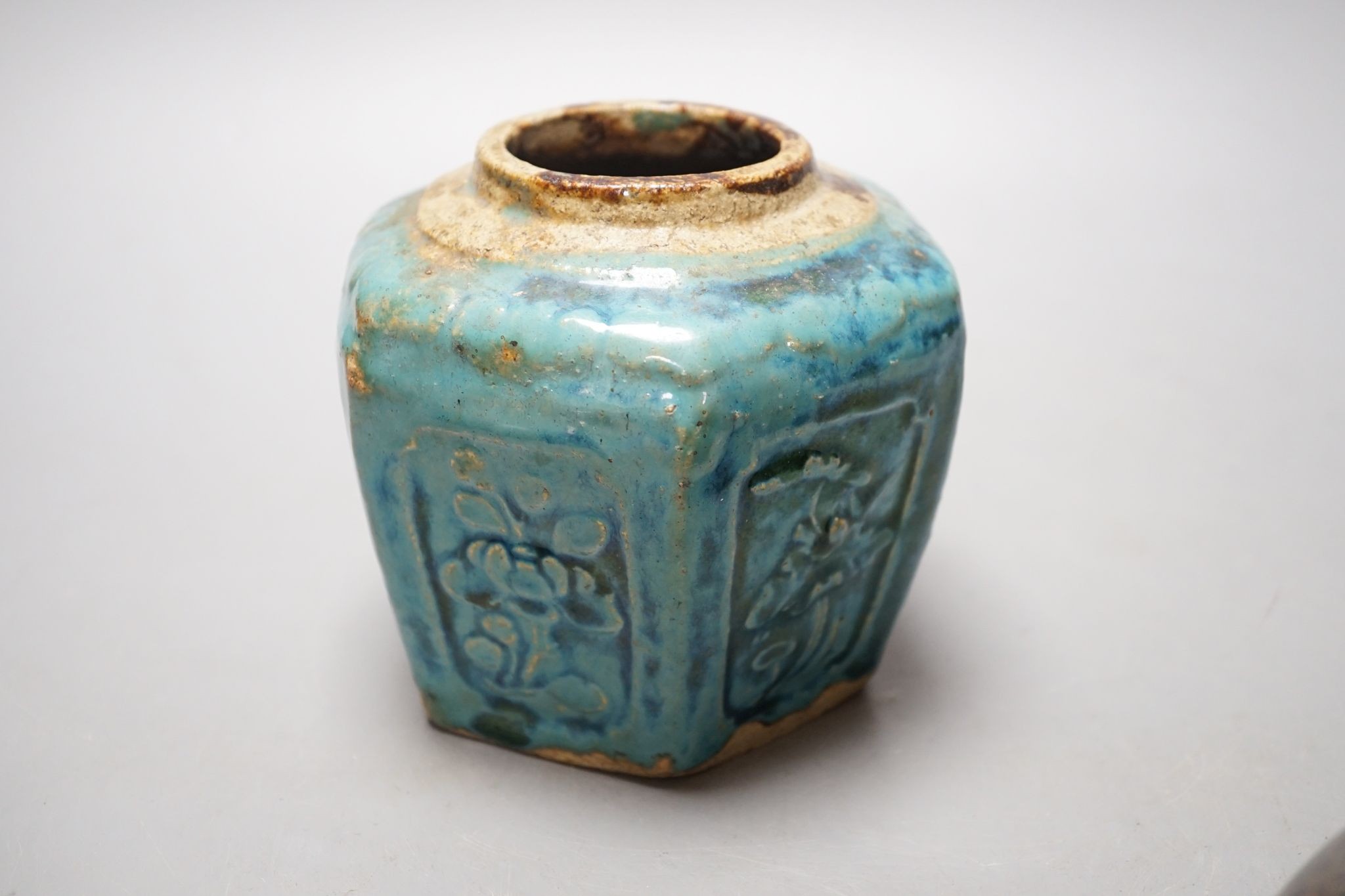 Two Chinese bronze handwarmers and a turquoise glazed jar